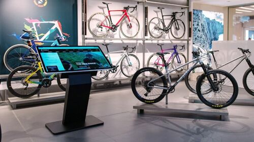 Freestanding touchscreen kiosk in a bike shop