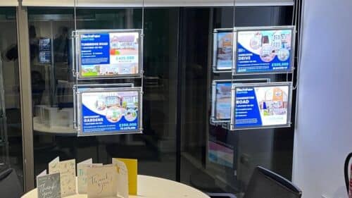 Estate Agent LED poster pockets inside Blackshaw Homes