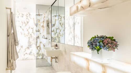 Flexible LED Light Sheet Illuminating a Decorative Marble Bathroom