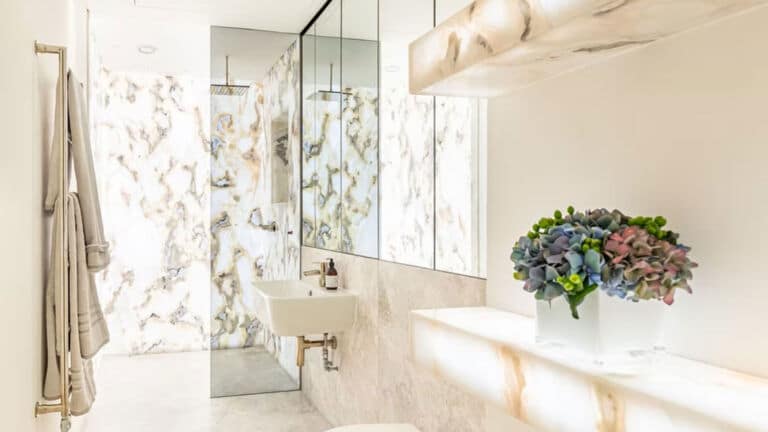 Flexible LED Light Sheet Illuminating a Decorative Marble Bathroom