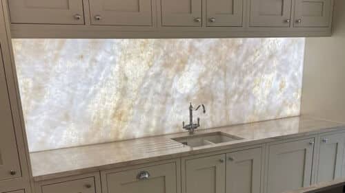 Flexible LED Light Sheet Illuminating a Kitchen Splashback